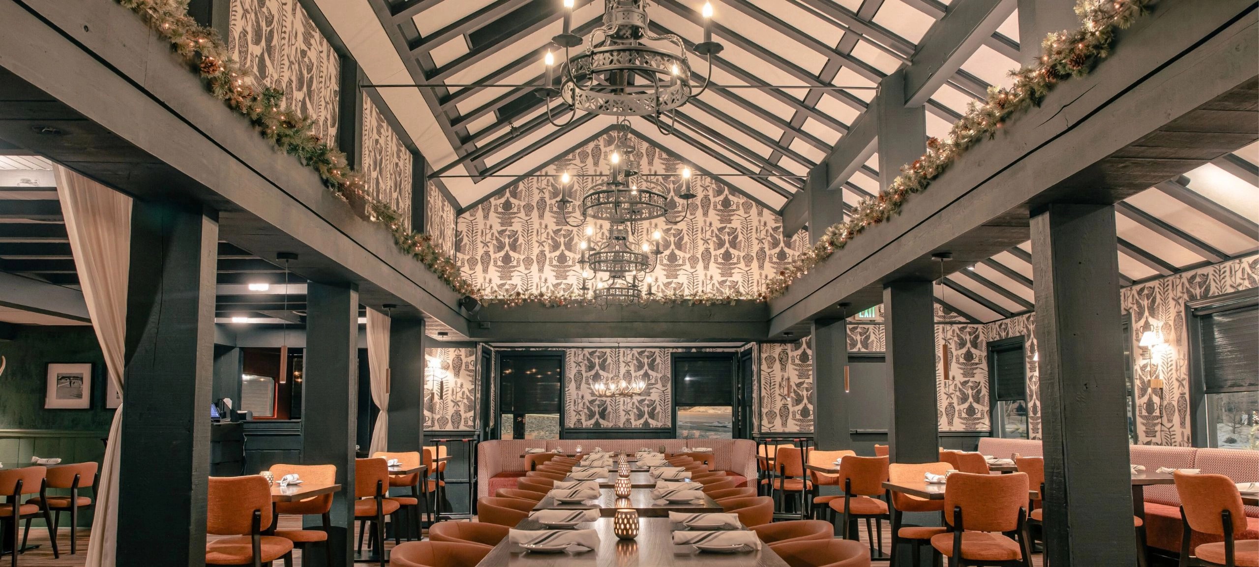 Main dining room at St. Moritz glowing for evening service