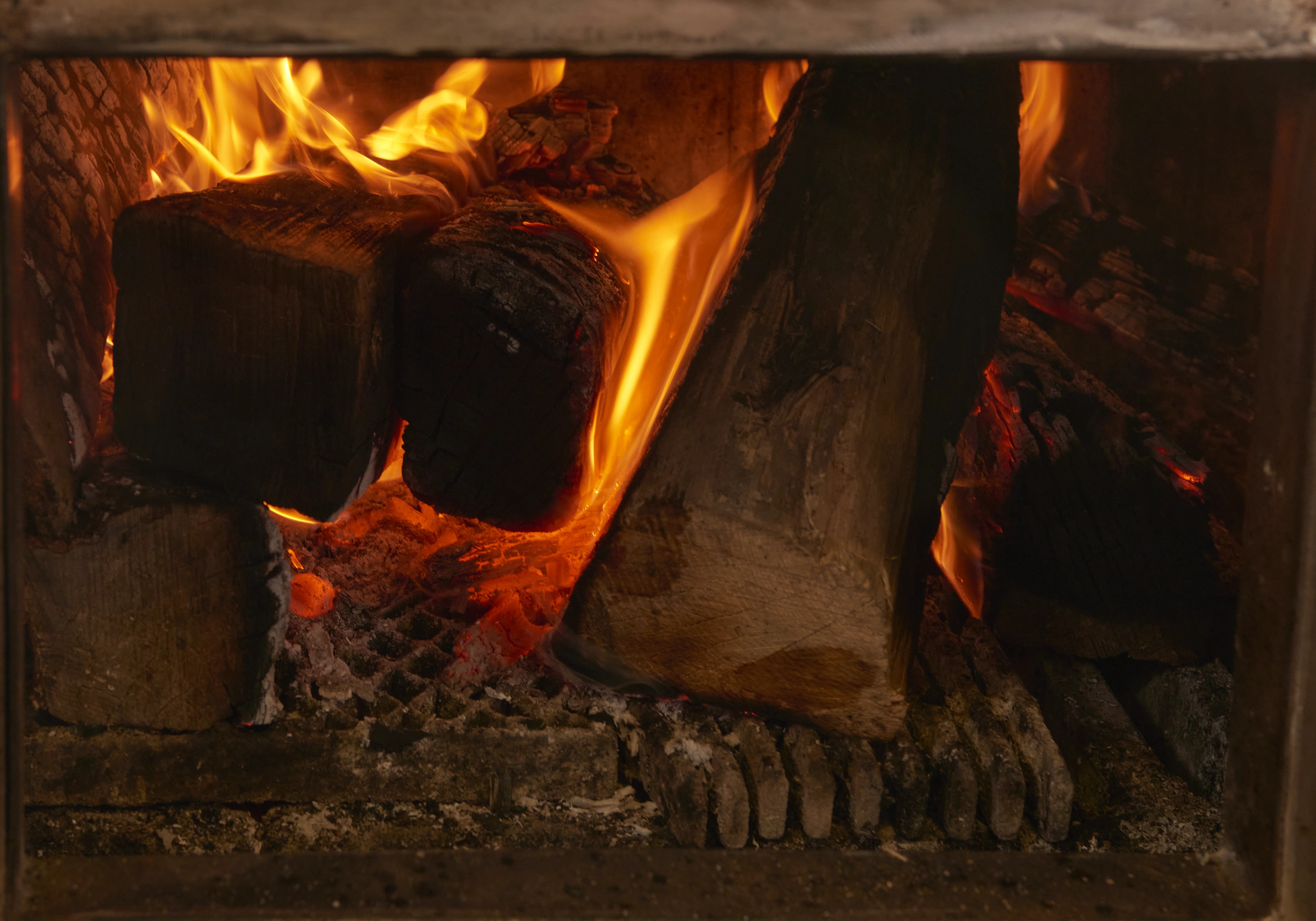 Wood fire burning on the St. Moritz grill
